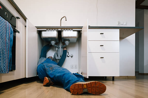 Professional Plumbing technician working in Plainville, NY